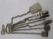 A silver plated chatelaine wit