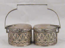 A silver plated double preserve pot