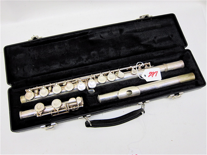A SILVER-PLATED MUSICAL FLUTE