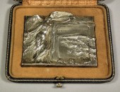 A silver plated rectangular pl