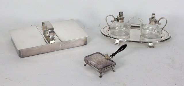 A silver plated two-section cigar