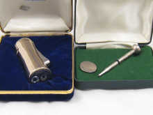 A silver propelling pencil in the