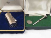 A silver propelling pencil in