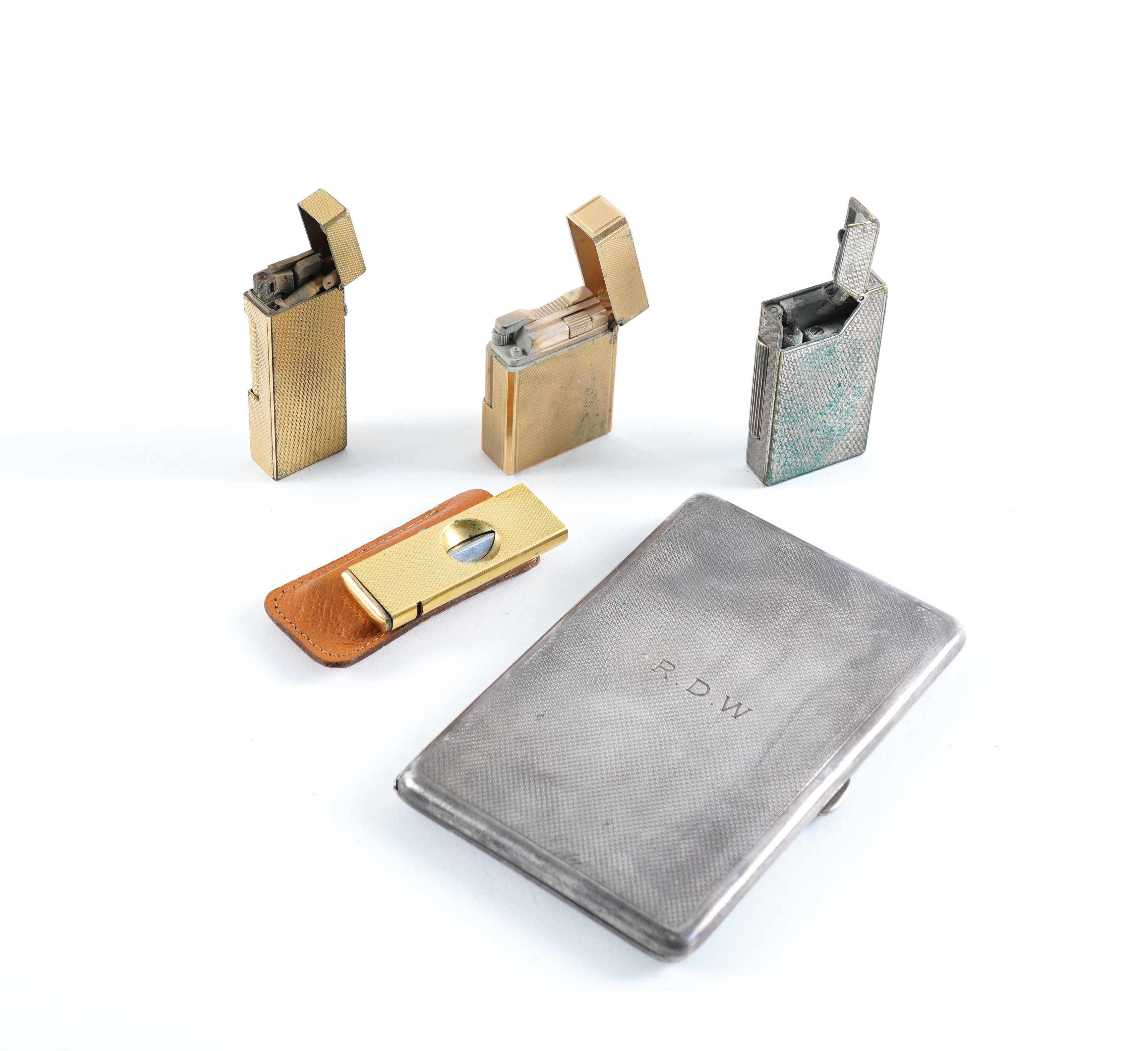 A SILVER RECTANGULAR CIGARETTE CASE