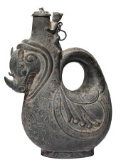 A SILVER RHINO HEAD SKIN BOTTL