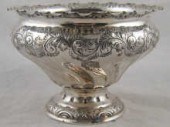 A silver rosebowl of swirl inv
