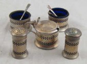 A silver set of two pepperette
