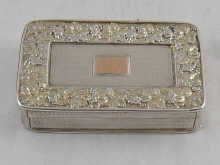 A silver snuff box with engine