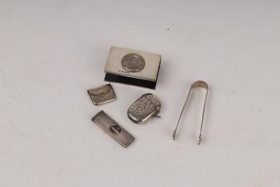 A silver stamp box of envelope