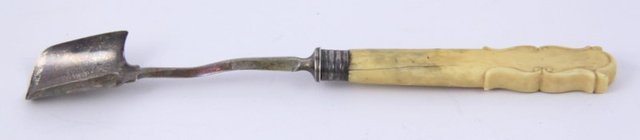 A silver stilton cheese scoop Aaron