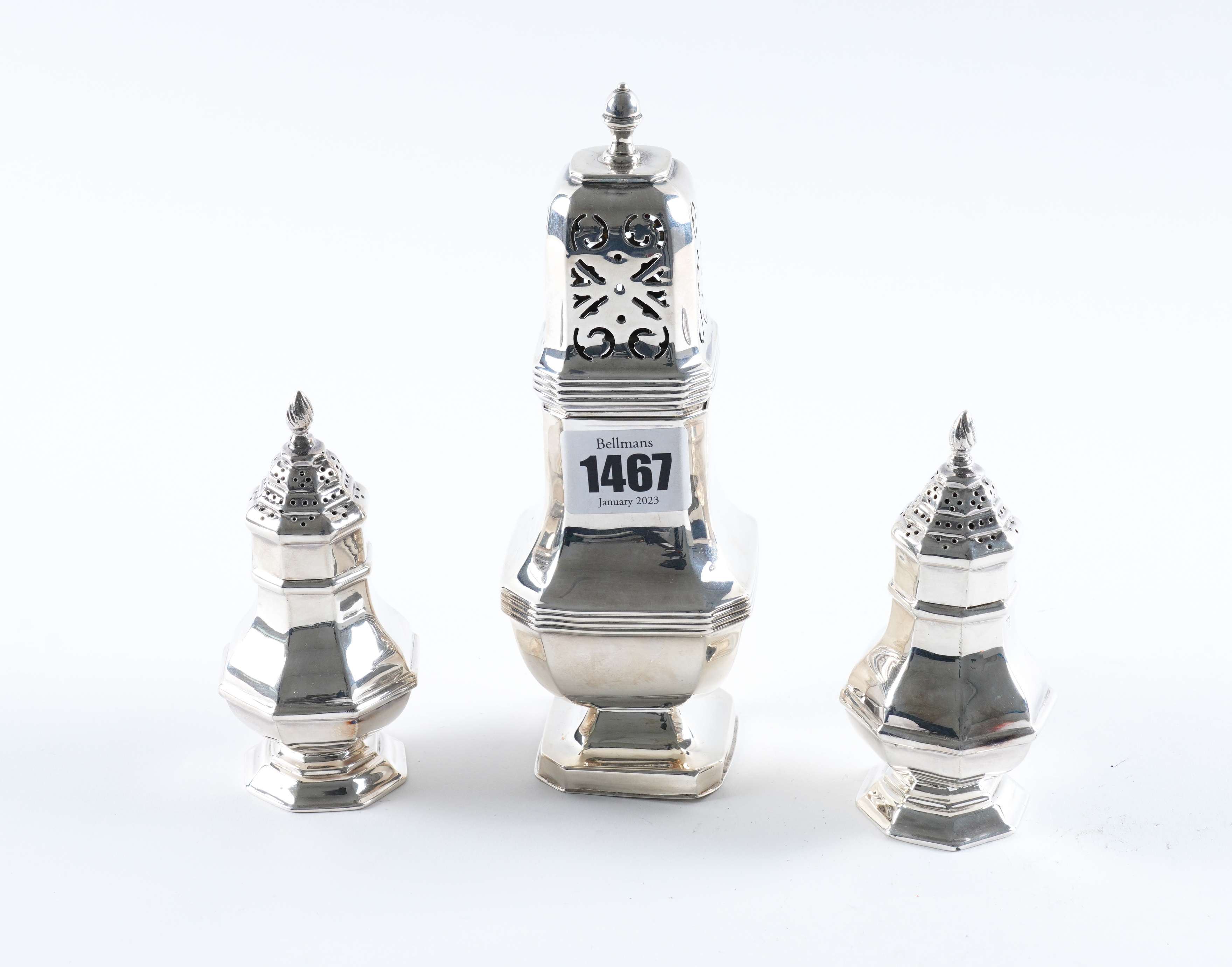 A SILVER SUGAR CASTER AND A PAIR OF