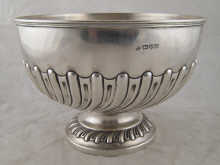 A silver swirl half fluted