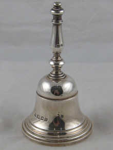 A silver table bell by Richard