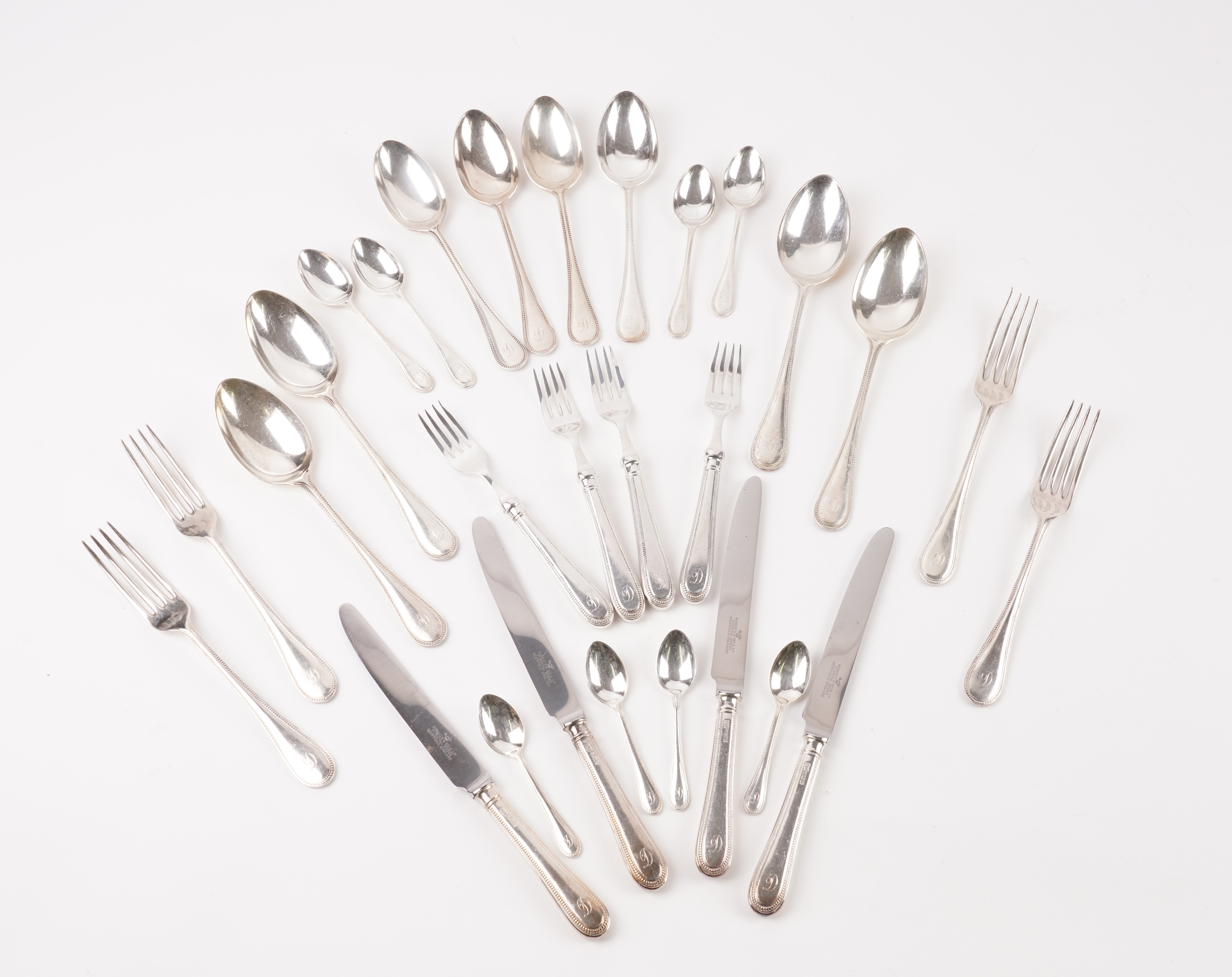 A SILVER TABLE SERVICE FOR TWELVE