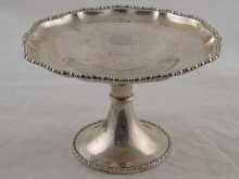 A silver tazza on spreading foot