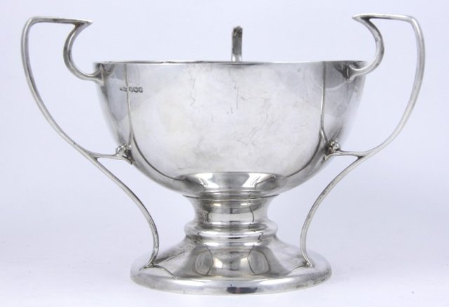 A silver three-handled presentation