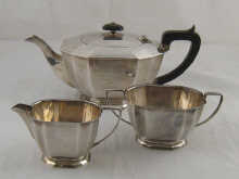 A silver three piece Art Deco