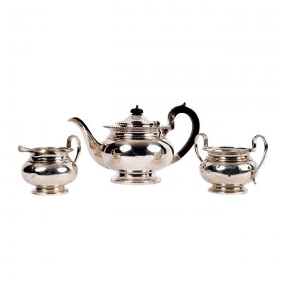 A silver three-piece tea set,