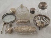 A silver topped cut glass cast