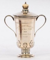 A silver trophy cup and cover,