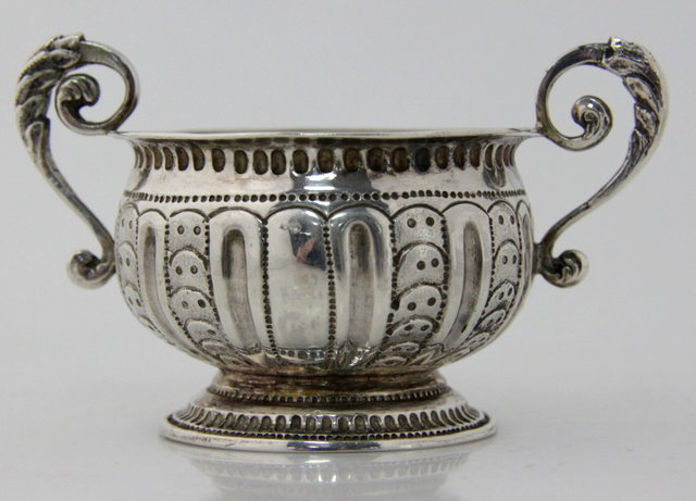 A silver twin-handled bowl