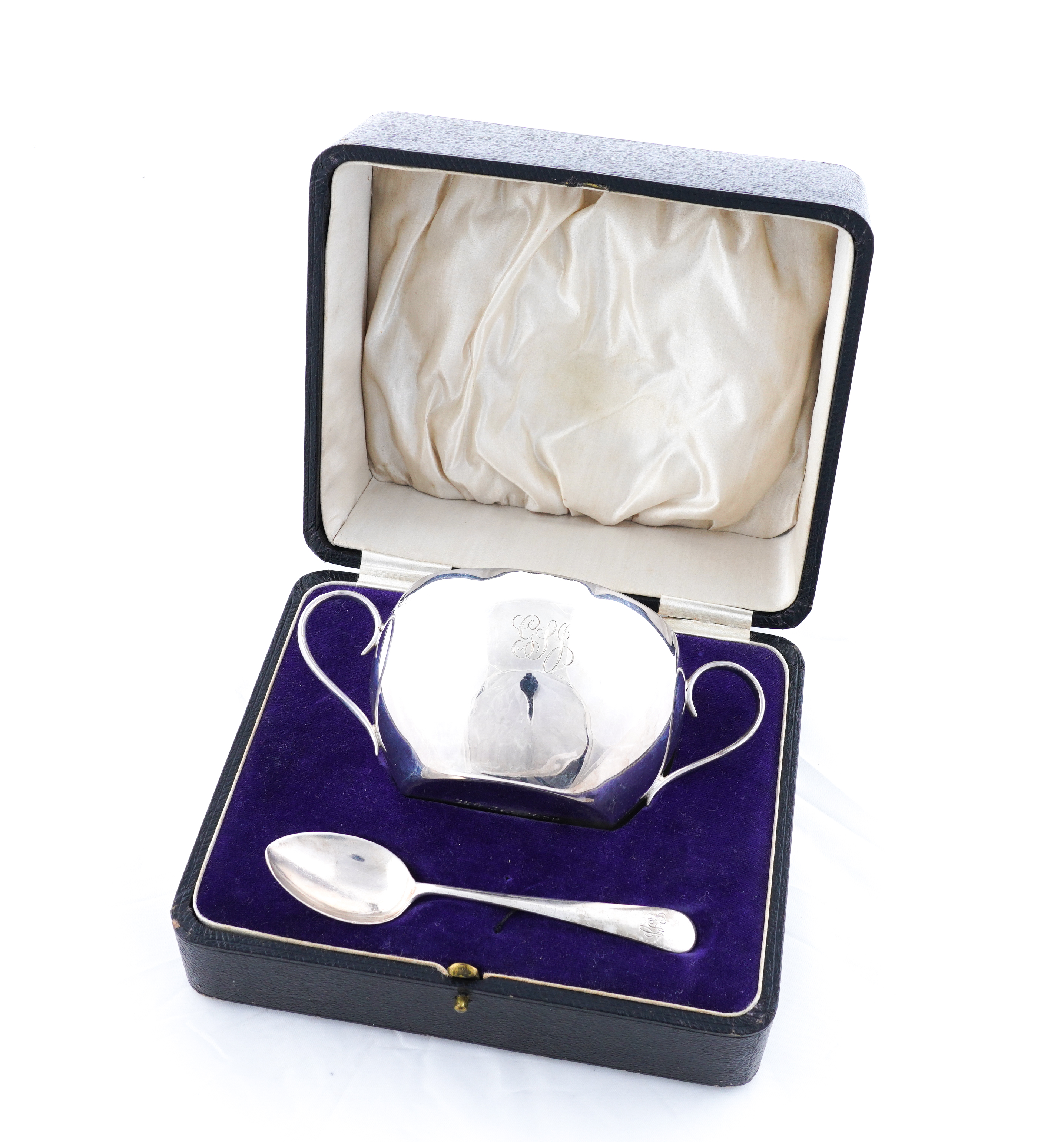 A SILVER TWIN HANDLED CHRISTENING