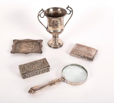 A silver twin-handled trophy cup,