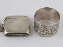 A silver vesta and chain hallmarked