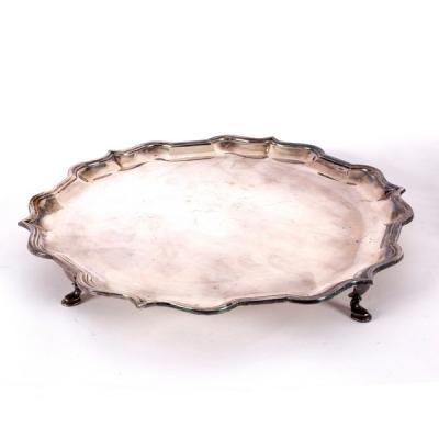 A silver waiter, with pie-crust