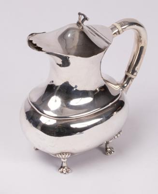 A silver water pitcher, Lee &