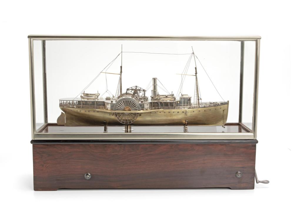 A SILVERED AND GILT MODEL OF THE