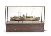 A SILVERED AND GILT MODEL OF T