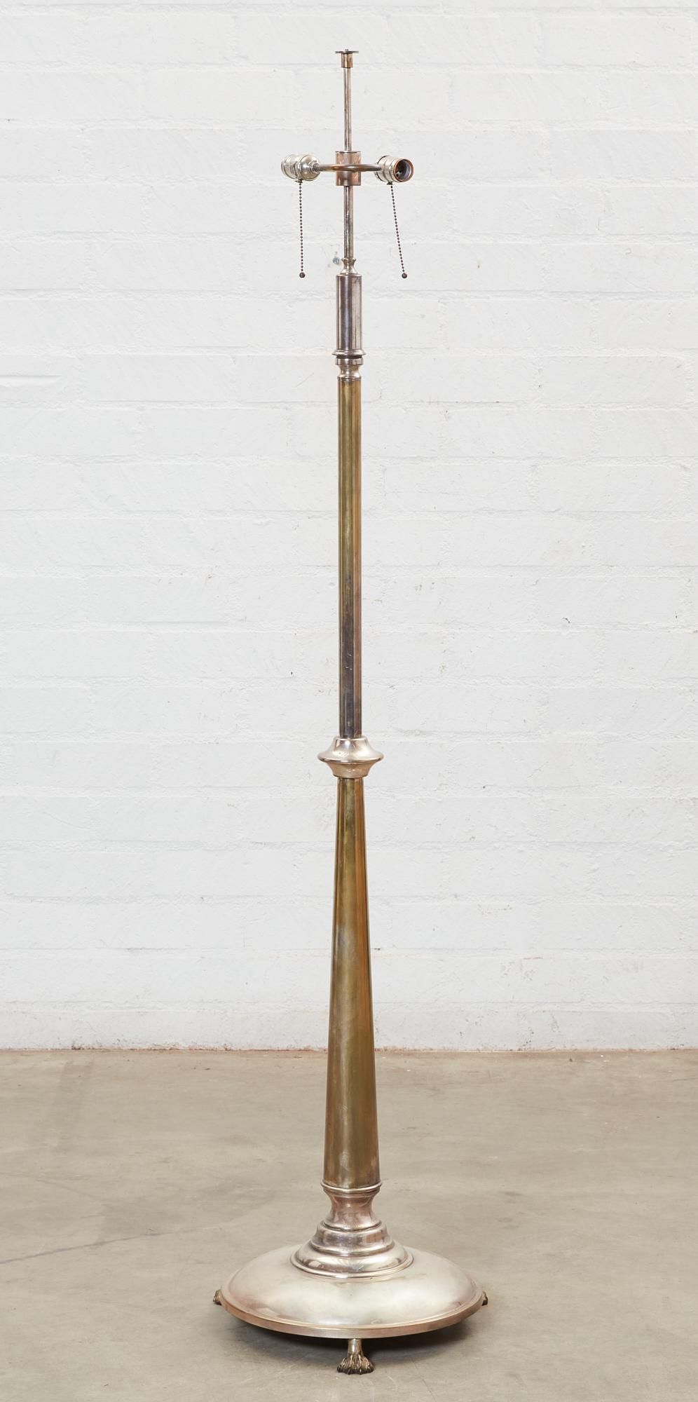A SILVERED BRASS FLOOR LAMPA