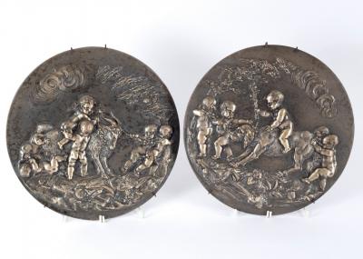 A silvered pair of cast metal