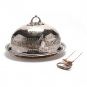 A SILVERPLATE MEAT DOME WITH U
