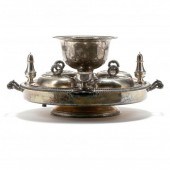 A SILVERPLATE ROTATING SUPPER