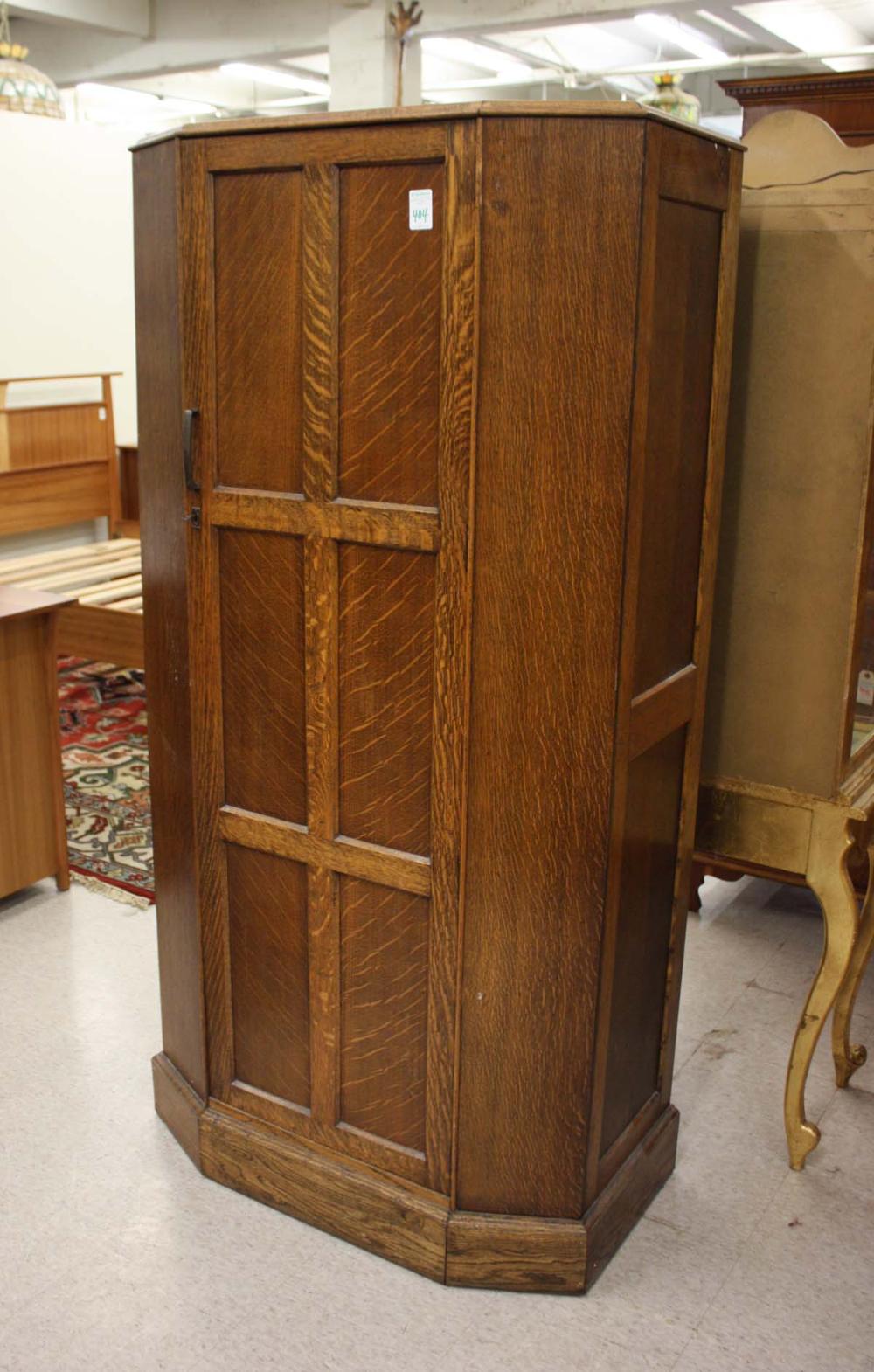 A SINGLE-DOOR OAK WARDROBE,