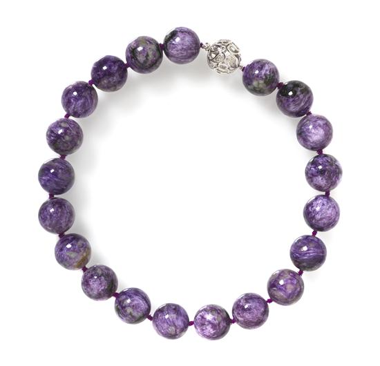 A Single Strand Charoite Bead