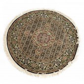 A SINO TABRIZ CIRCULAR CARPET