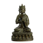 A SINO-TIBETAN BRONZE MAITREYA