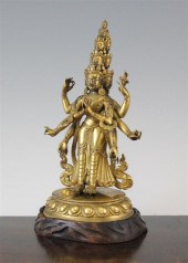 A Sino-Tibetan gilt bronze fig