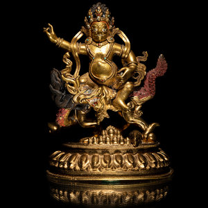A Sino-Tibetan Gilt Bronze Figure