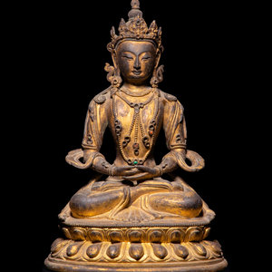A Sino-Tibetan Gilt Bronze Figure