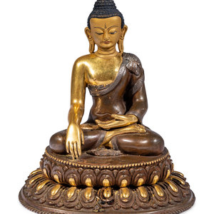 A Sino-Tibetan Gilt Bronze Figure