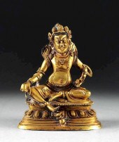 A SINO-TIBETAN GILT BRONZE FIG