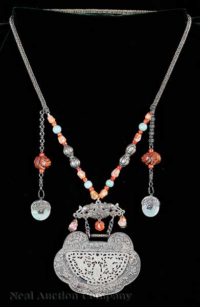 A Sino-Tibetan Jade Inset White
