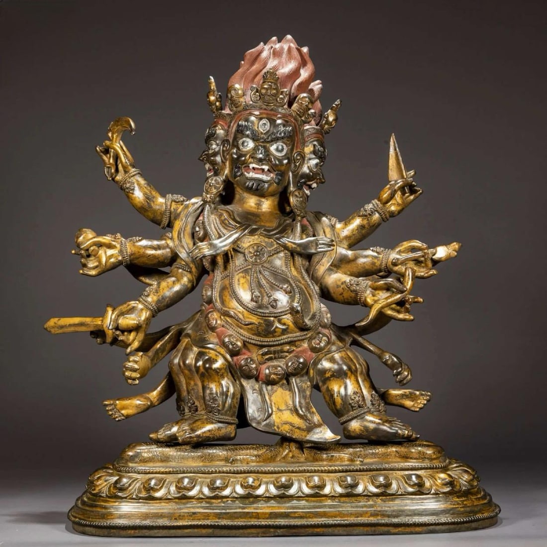 A SIX-ARMED MAHAKALA BUDDHA STATUEA