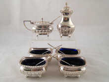 A six piece silver cruet set