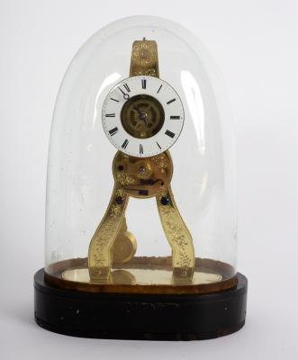 A small brass skeleton clock,