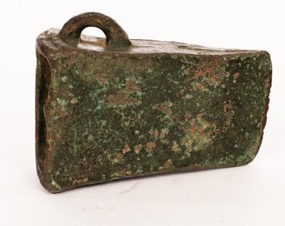 A small Chinese bronze axe head,